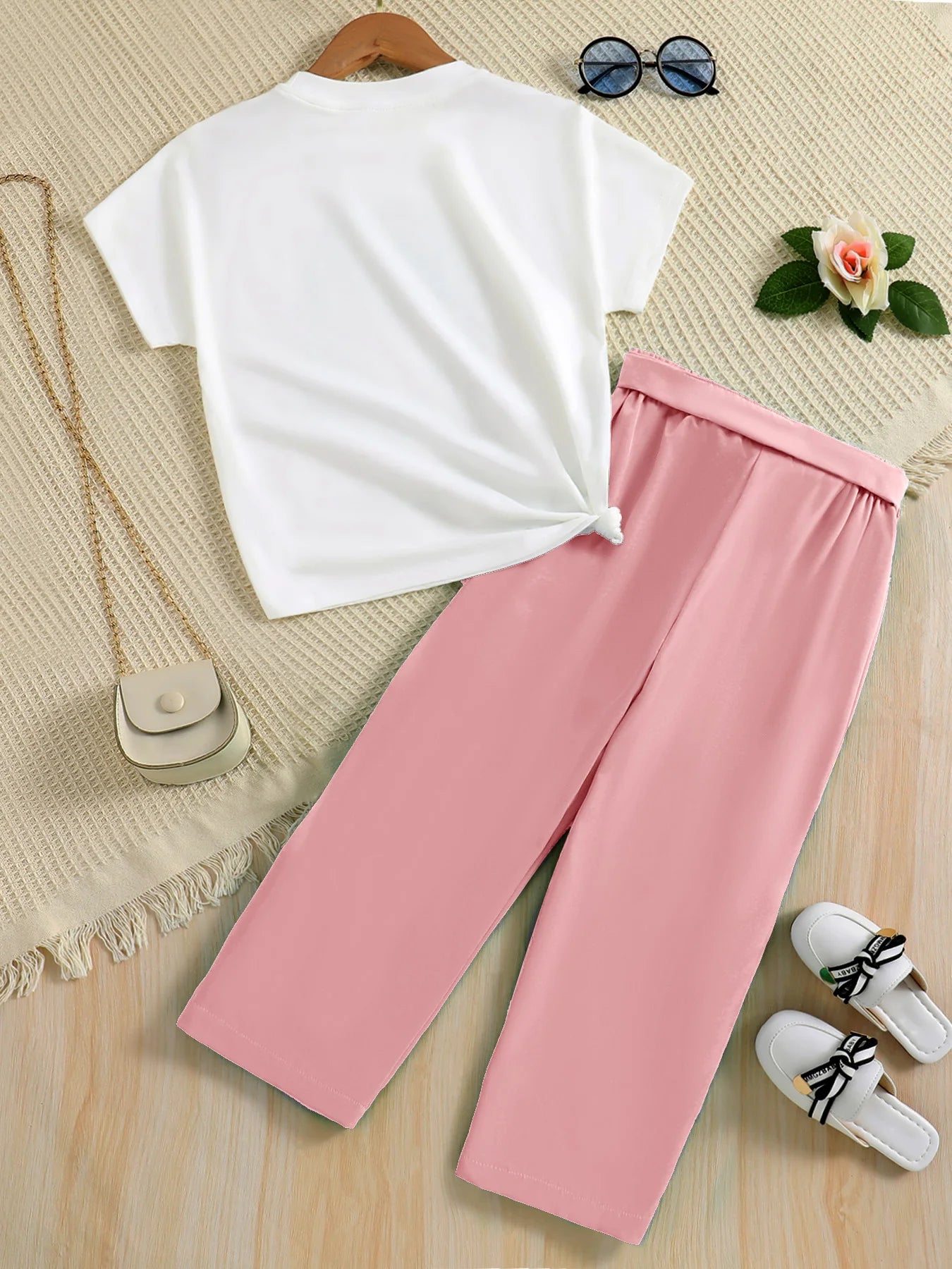 A set of two fashionable and simple cartoon print cool round-neck knitted tops and summer thin wide-leg pants for girls