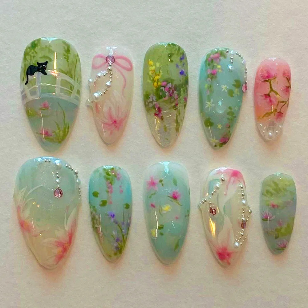 24pcs Aurora Nude Pink Press on Nails Almond Acrylic Sweet Fake Nails with 3d Charms Butterfly Florals Full Cover Flower Nails
