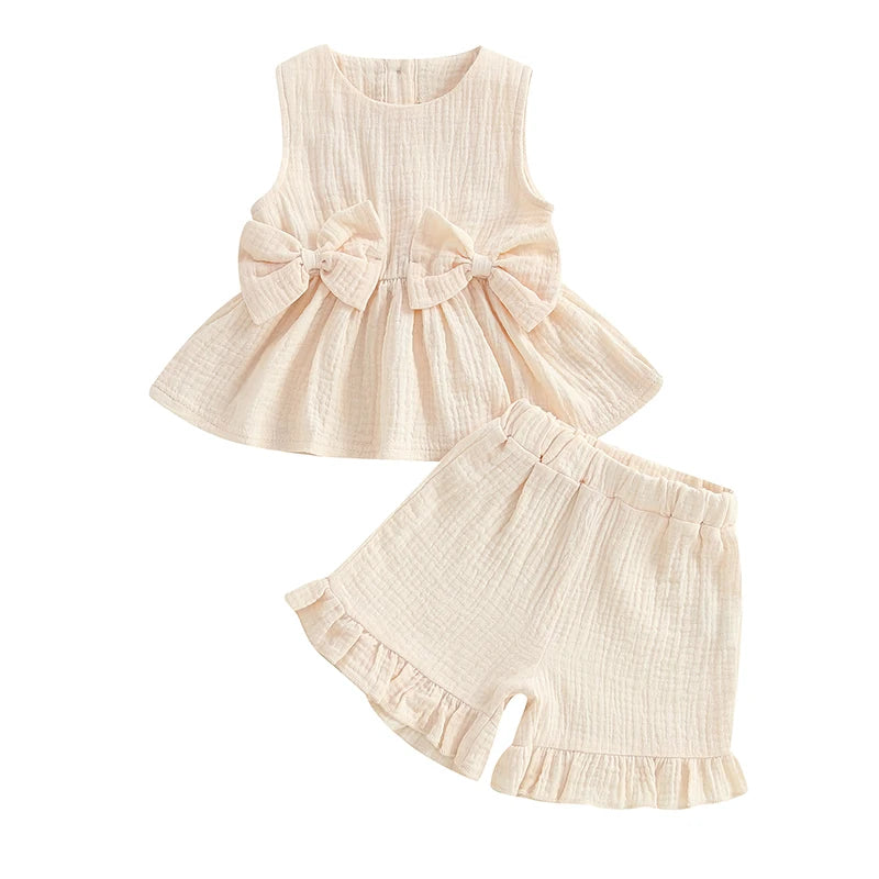 2024-12-24 Lioraitiin Toddler Baby Girl Summer Clothes Solid Color Bow Round Neck Tank Tops + Elastic Waist Ruffled Shorts Set