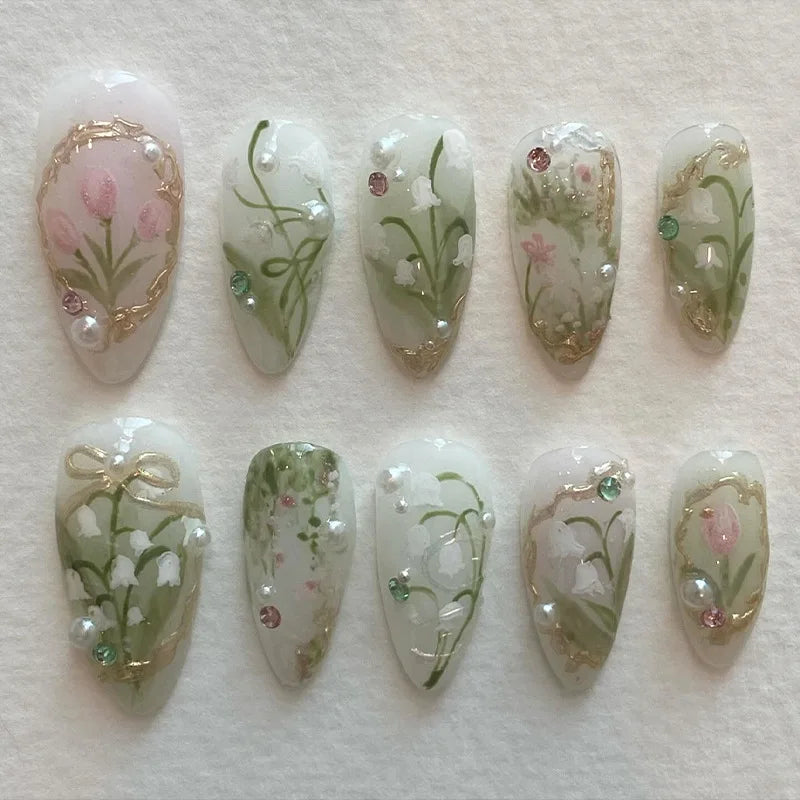 24pcs Aurora Nude Pink Press on Nails Almond Acrylic Sweet Fake Nails with 3d Charms Butterfly Florals Full Cover Flower Nails