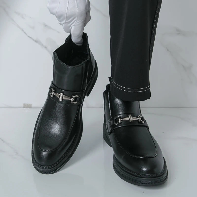 In the autumn of 2025 the British business formal wear Chelsea boots features a man wearing high-top patent leather shoes