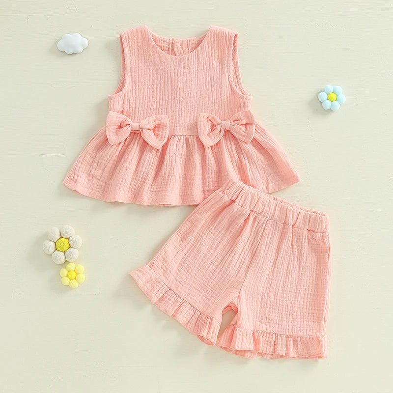 2024-12-24 Lioraitiin Toddler Baby Girl Summer Clothes Solid Color Bow Round Neck Tank Tops + Elastic Waist Ruffled Shorts Set