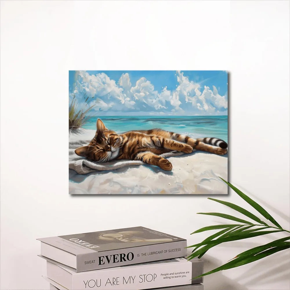 A coastal cat canvas wall art, print of a cat napping on the beach, wood-framed Marine theme decor, 11.8x15.7 inches
