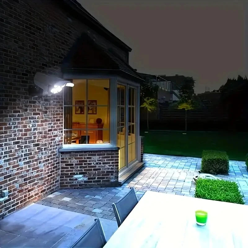 Outdoor Camping Solar Lights Motion Sensor 77 LED FloodLight Wireless Waterproof Dummy Fake Camera Courtyard Garage Street Light