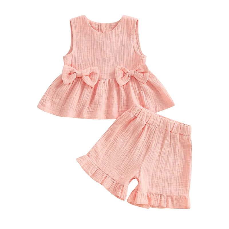 2024-12-24 Lioraitiin Toddler Baby Girl Summer Clothes Solid Color Bow Round Neck Tank Tops + Elastic Waist Ruffled Shorts Set