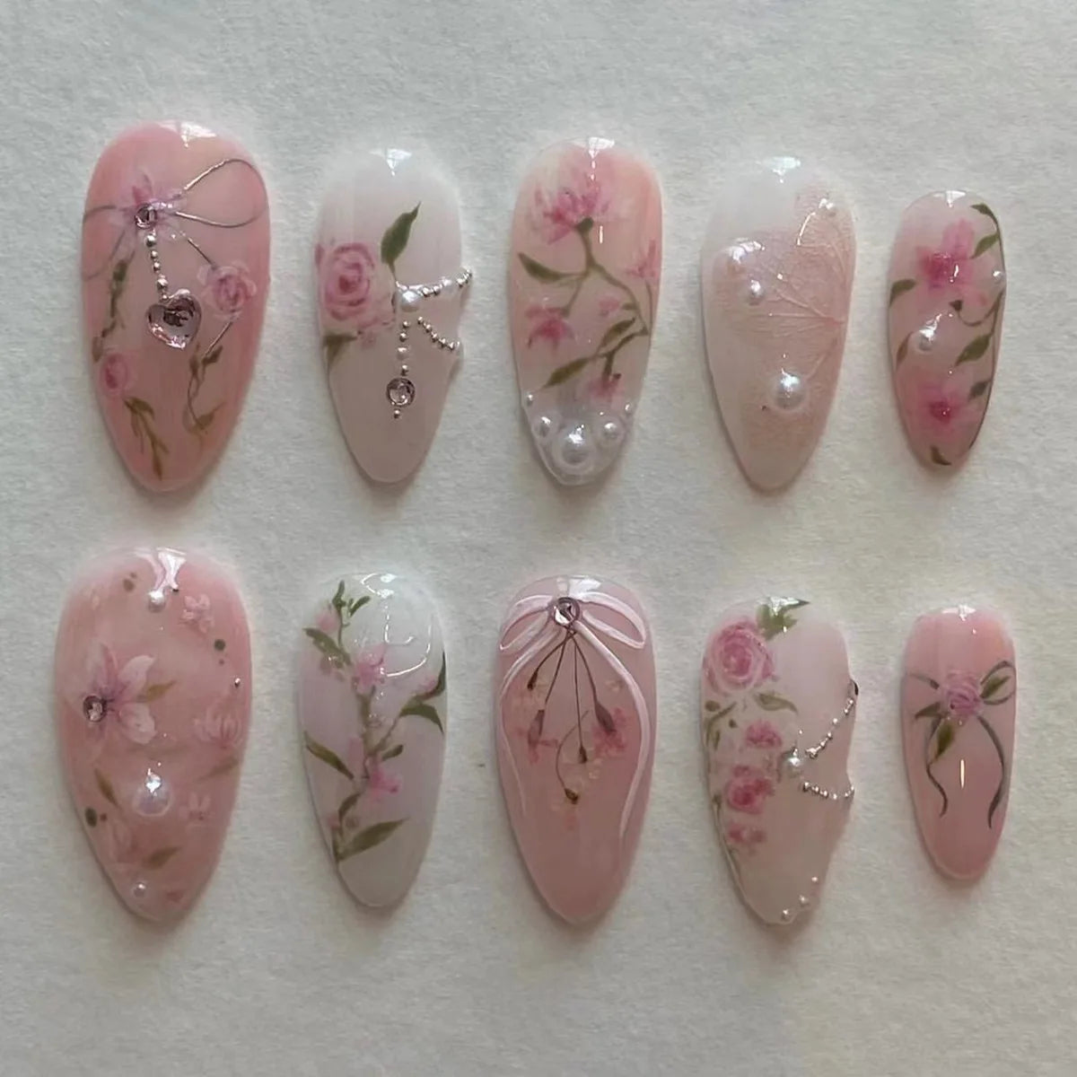 24pcs Aurora Nude Pink Press on Nails Almond Acrylic Sweet Fake Nails with 3d Charms Butterfly Florals Full Cover Flower Nails